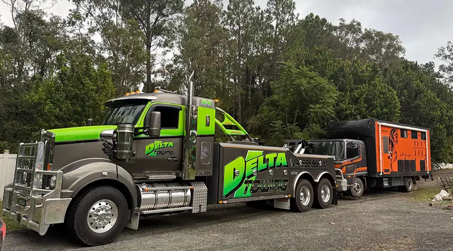 Delta Heavy Towing recovery unit working at night in Brisbane