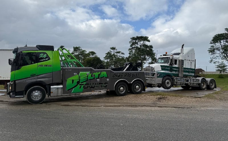 Heavy-duty tow truck arriving at a roadside emergency